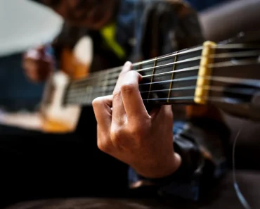5 Easy Ways To Improve Your Playing With A Guitar